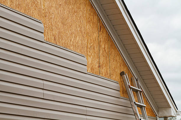 Professional Siding Contractor technician working in Georgetown, TX